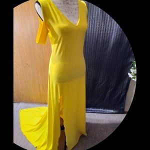 A prom dress, yellow in color, L-XL in size, with a Long train. Locally made.